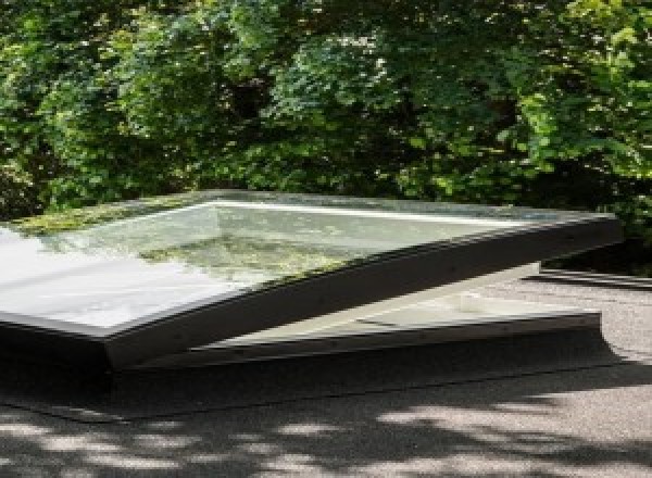 Installateur de puit de lumière Vélux sur toit plat à Curbans