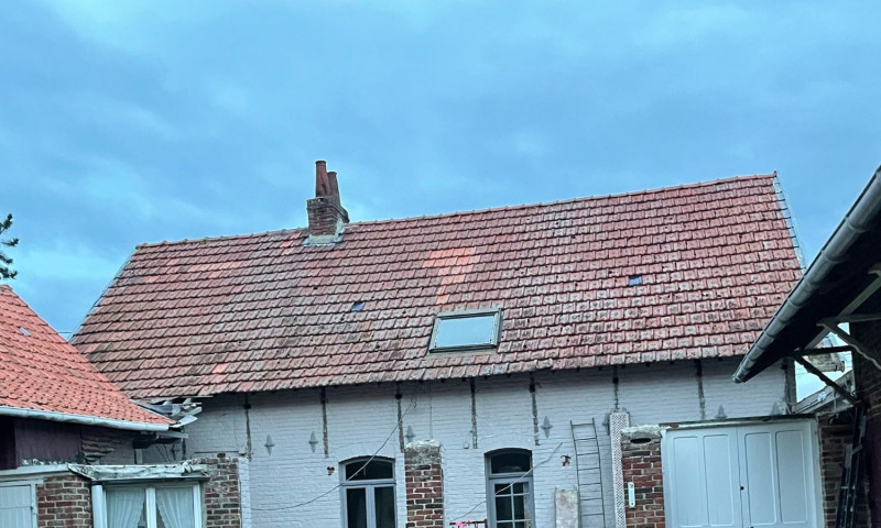 Rénovation d'une toiture en tuiles