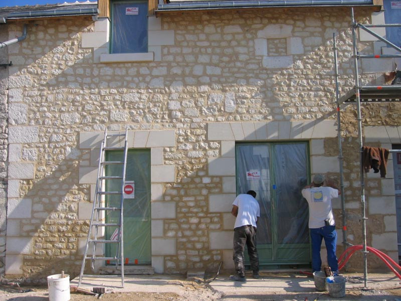 Rénovation de façade en pierre à Grainville-Langannerie