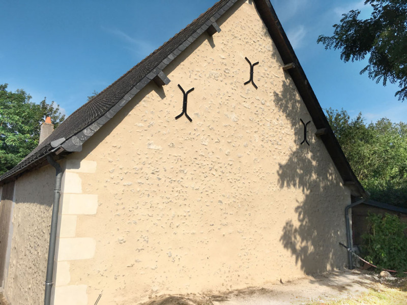 Rénovation de façade en pierre à Roullours