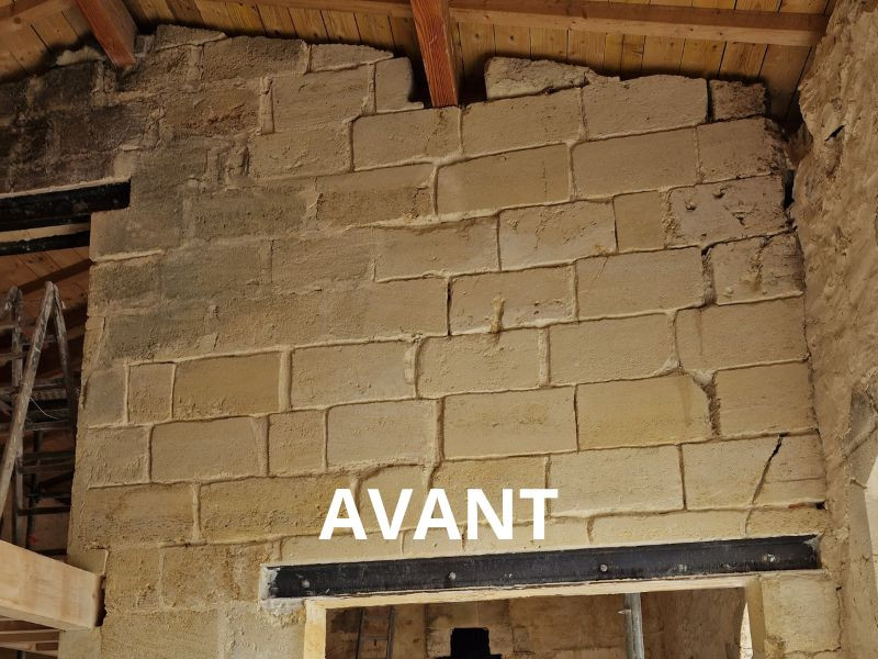 Réalisation d'une rénovation d'un mur en pierre